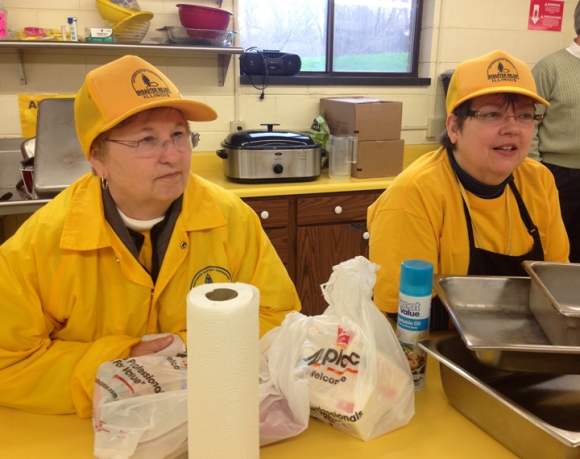 Kitchen volunteers starting preparing meals Monday evening, working out of Woodland Baptist in Peoria. The church has graciously rearranged schedules and plans to accommodate the storm response teams.