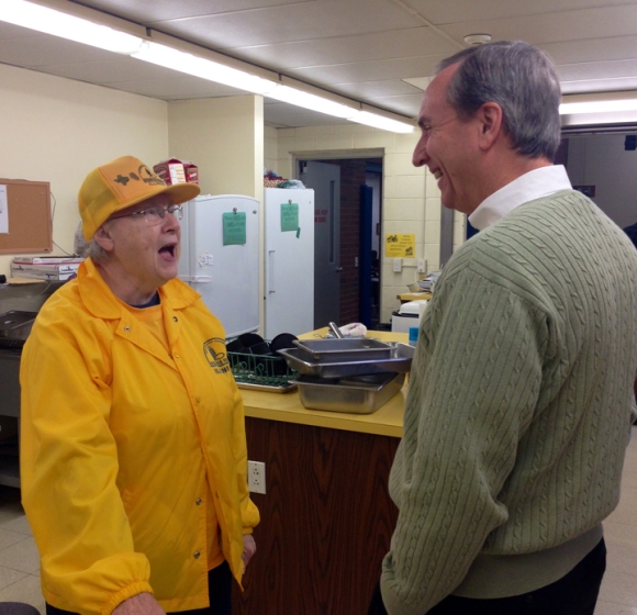 Adams visits with Linda Blough, a Disaster Relief volunteer from Dayton Avenue Baptist in Peoria.