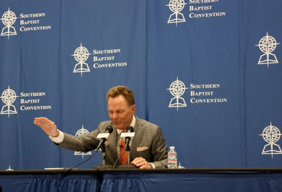 Newly elected SBC President Ronnie Floyd prays for the Convention during a post-election press conference.