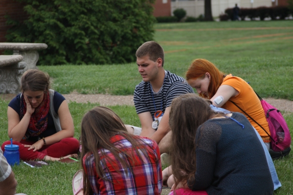 Students meet in their "family group" at Super Summer, IBSA's discipleship week for students in Greenville, Ill.