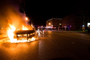 Numerous fires were set in Ferguson, Mo., following the decision by a grand jury not to charge Officer Darren Wilson in the shooting death of 18-year-old Michael Brown. Photo from BPNews.net by Victor Miller